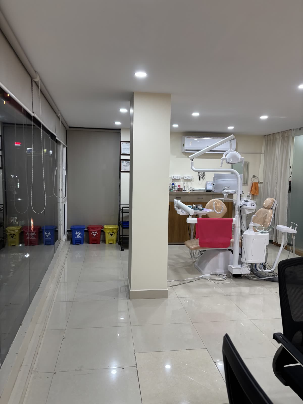 Corridor and dental chair at Enamel Dental, Argora.