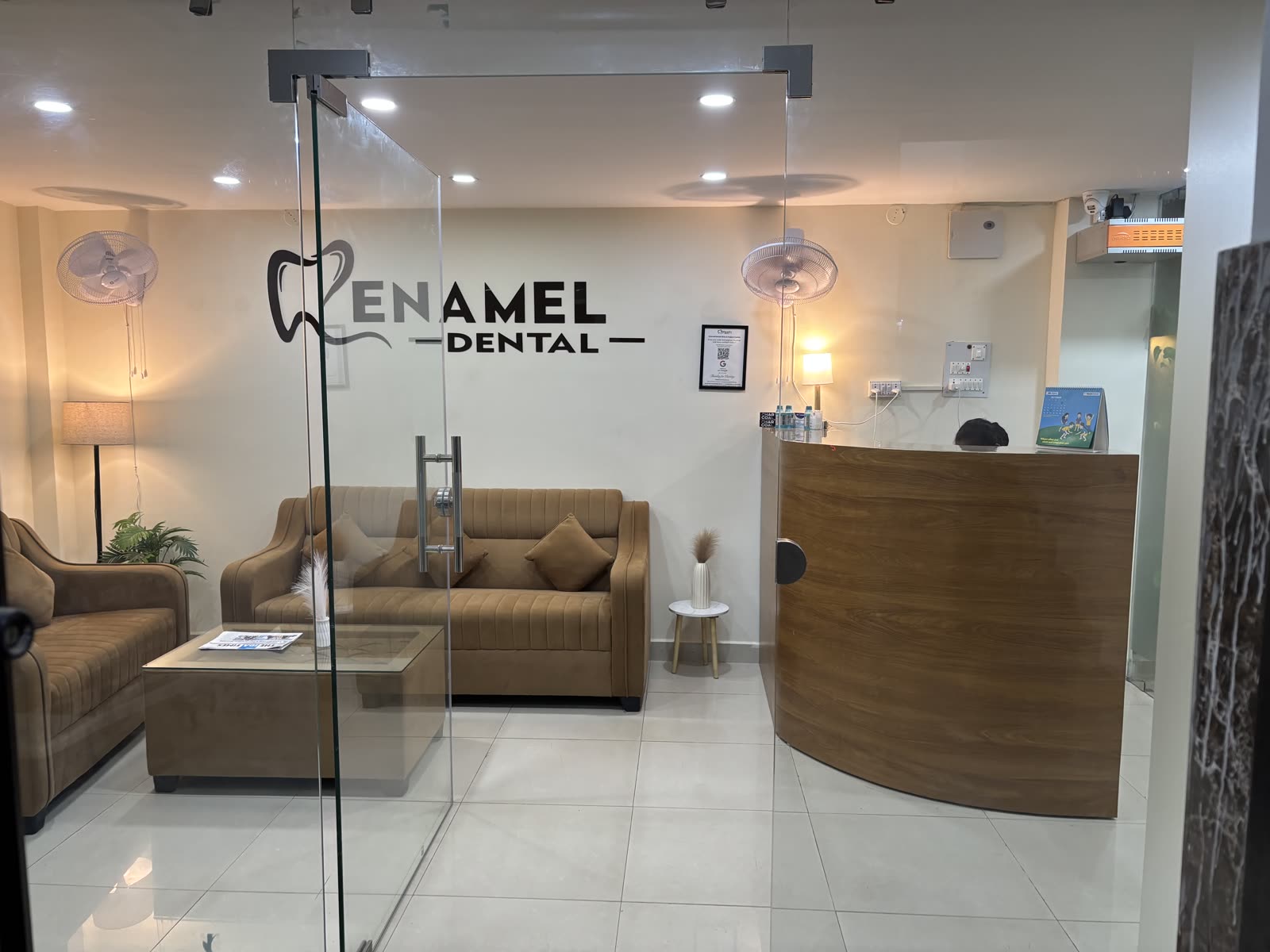 Waiting room at Enamel Dental, with the clinic name on the wall, Argora.
