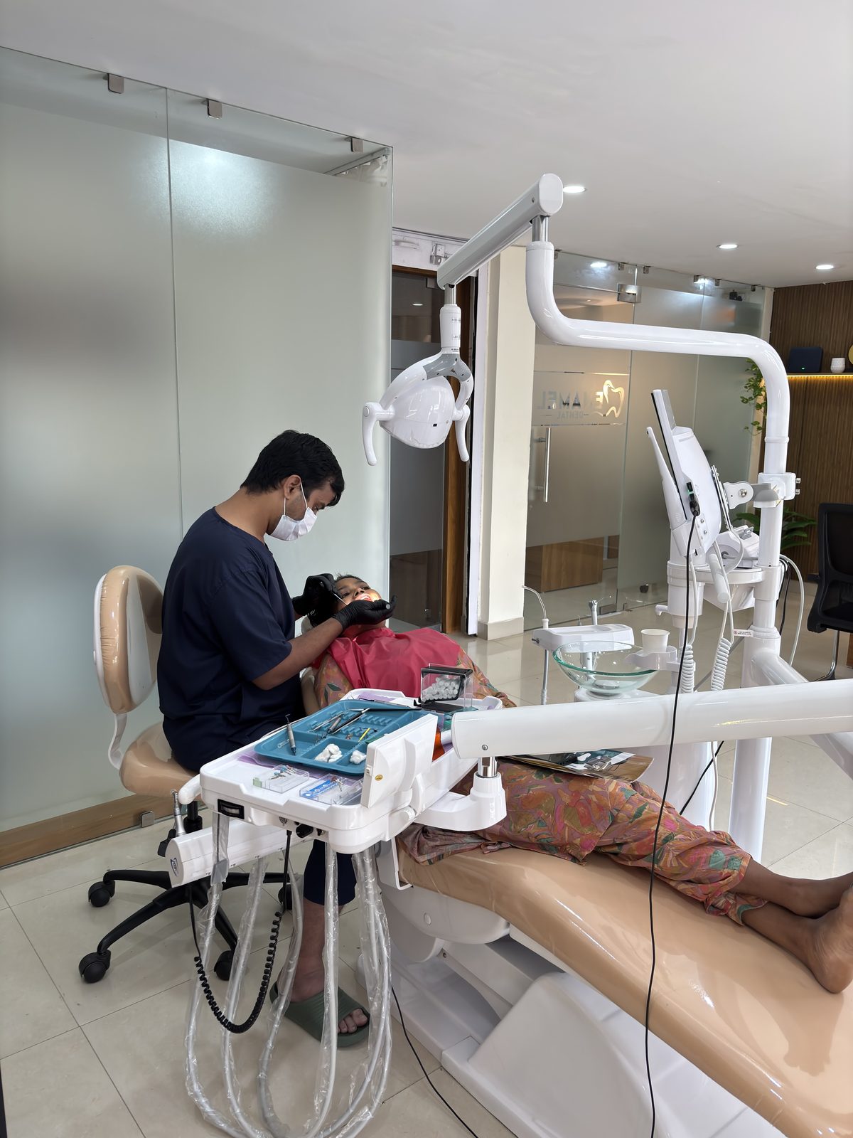 Dr. Akhouri Sanskar treating a patient at Enamel Dental, Argora.